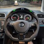 VW Polo Vento Performance Steering Wheel with carbon finish, paddle shifter support, touch controls and RPM light options for a sportier driving feel.