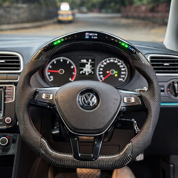 VW Polo Vento Performance Steering Wheel with carbon finish, paddle shifter support, touch controls and RPM light options for a sportier driving feel.